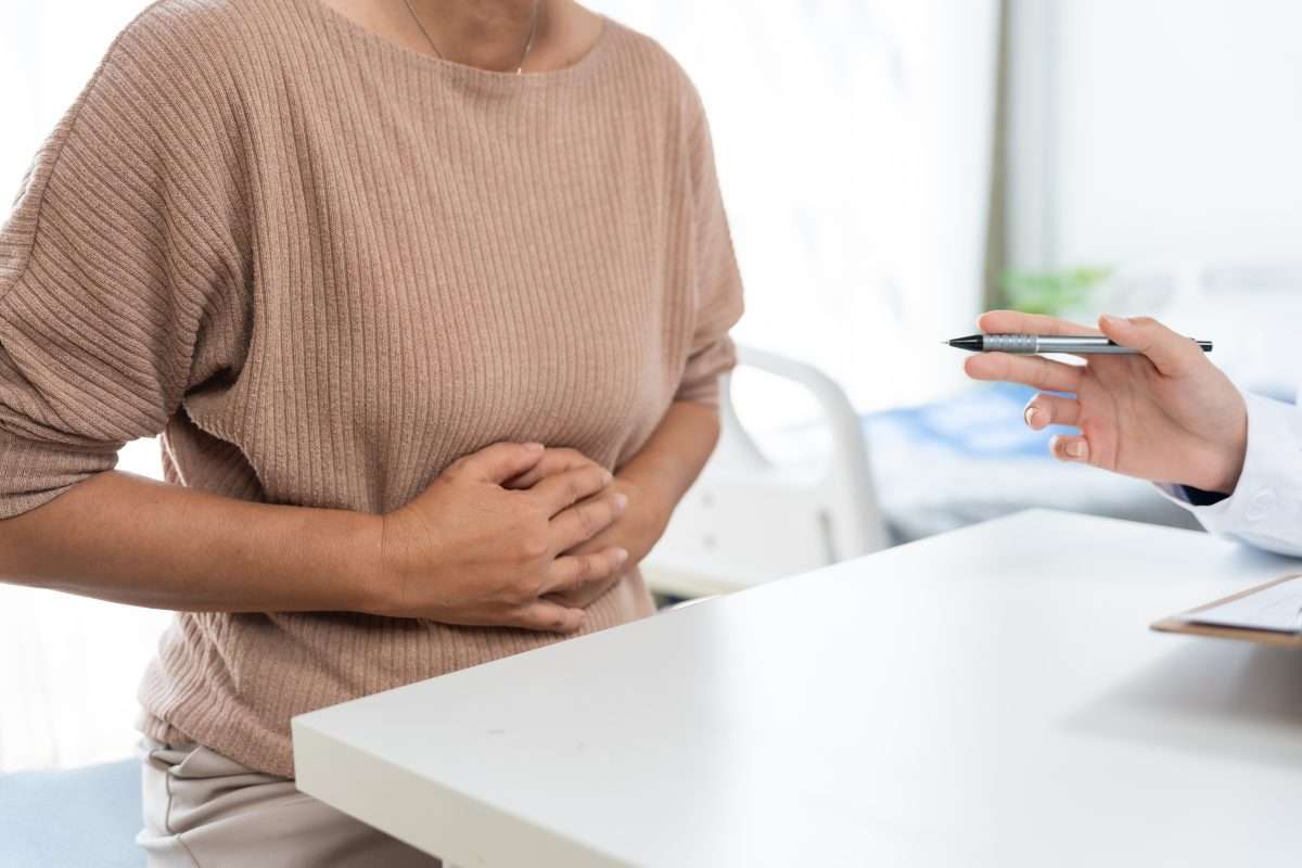 TCM illustration of functional dyspepsia with epigastric obstruction and chest oppression symptoms